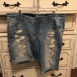 Torrid distressed denim Bermuda shorts.